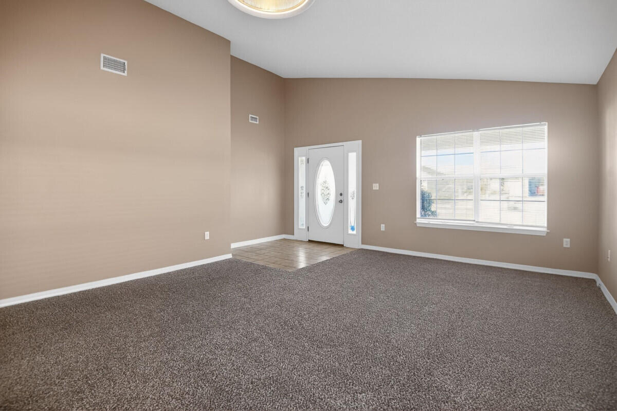 4654 Sunsail Circle Destin, FL 32541 - Photo 4 of 22 an empty room with windows