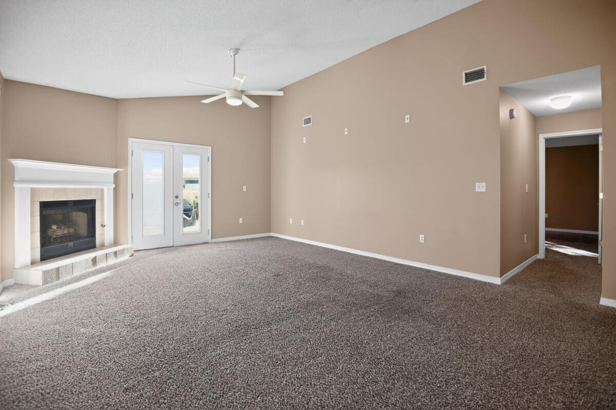 4654 Sunsail Circle Destin, FL 32541 - Photo 5 of 22 a view of a livingroom with an empty space and a fireplace