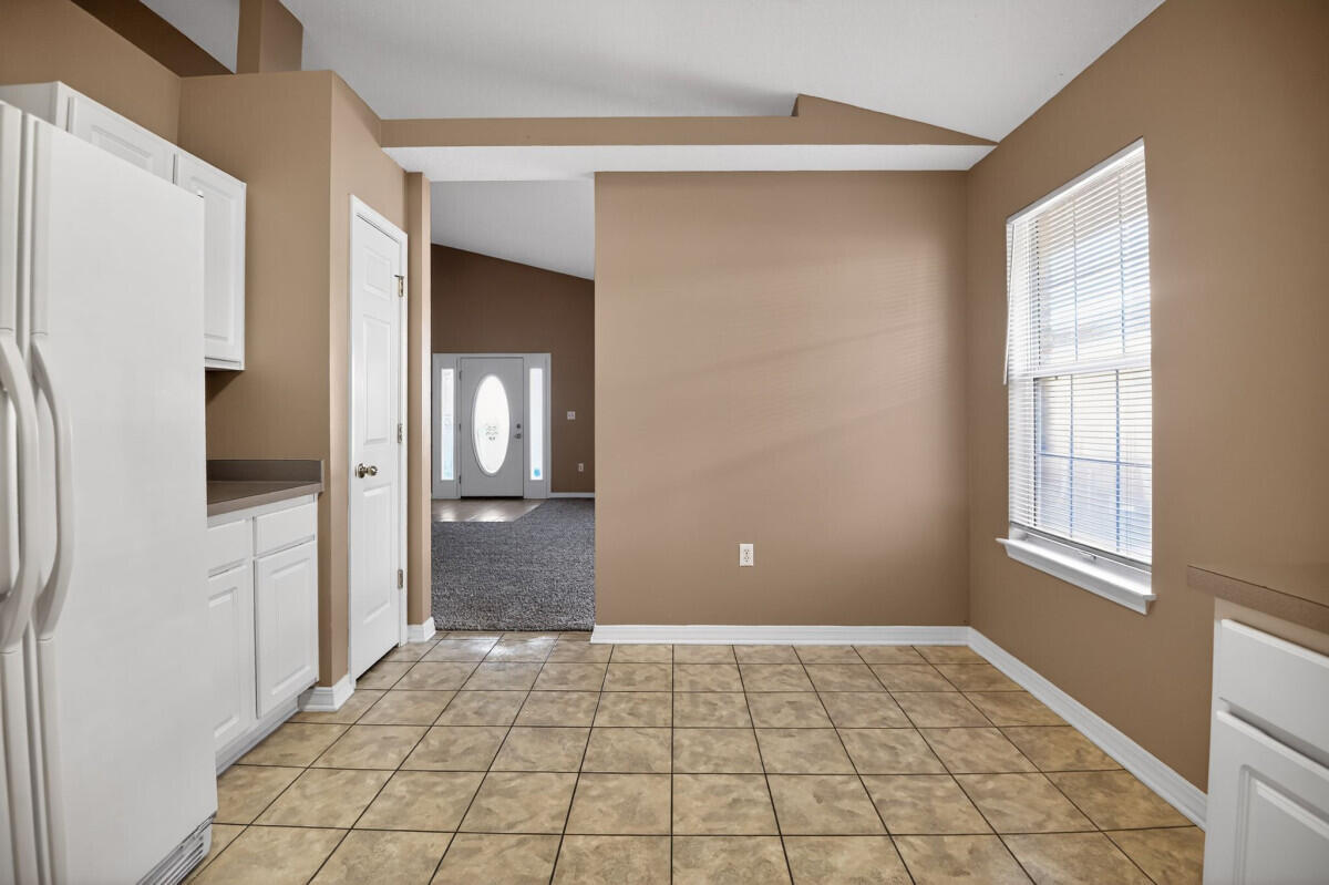 4654 Sunsail Circle Destin, FL 32541 - Photo 9 of 22 a view of an empty room with bathroom and a window
