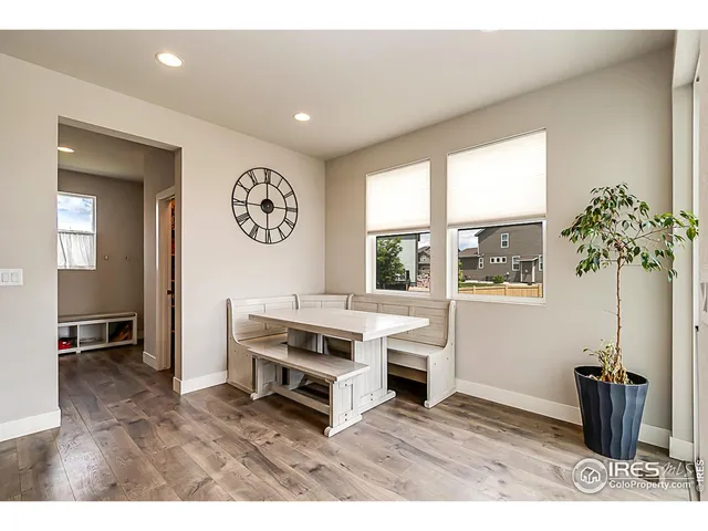 a view of workspace with furniture and window