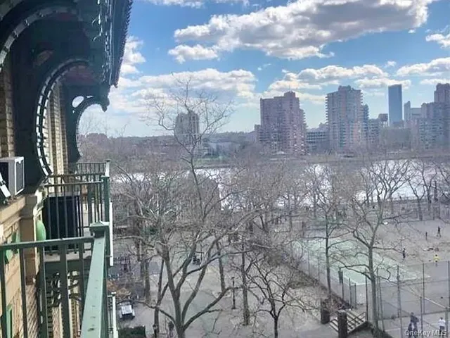 a view of a city with tall buildings