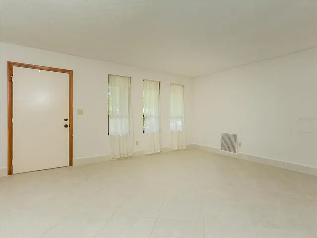 an empty room with a natural light