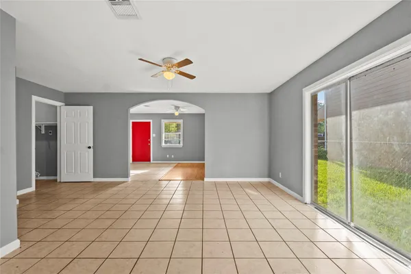 a view of an empty room and window