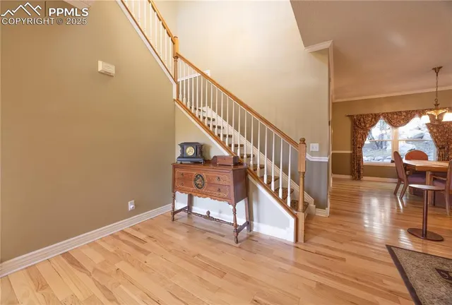 a large kitchen with a chandelier