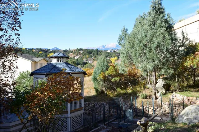 a view of a balcony with chairs