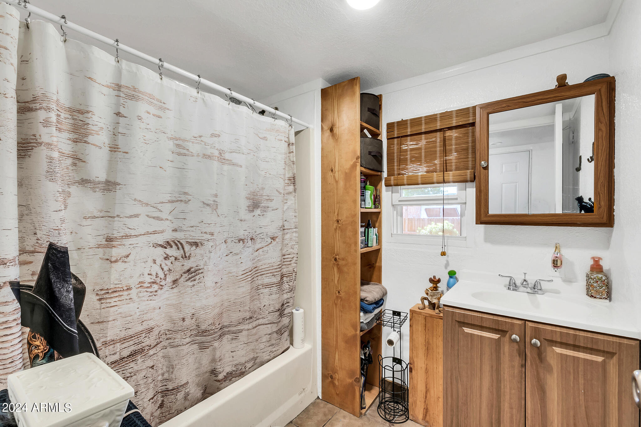 130 East McKellips Road, Unit 48 Mesa, AZ 85201 - Photo 13 of 24 a bathroom with a sink and a mirror