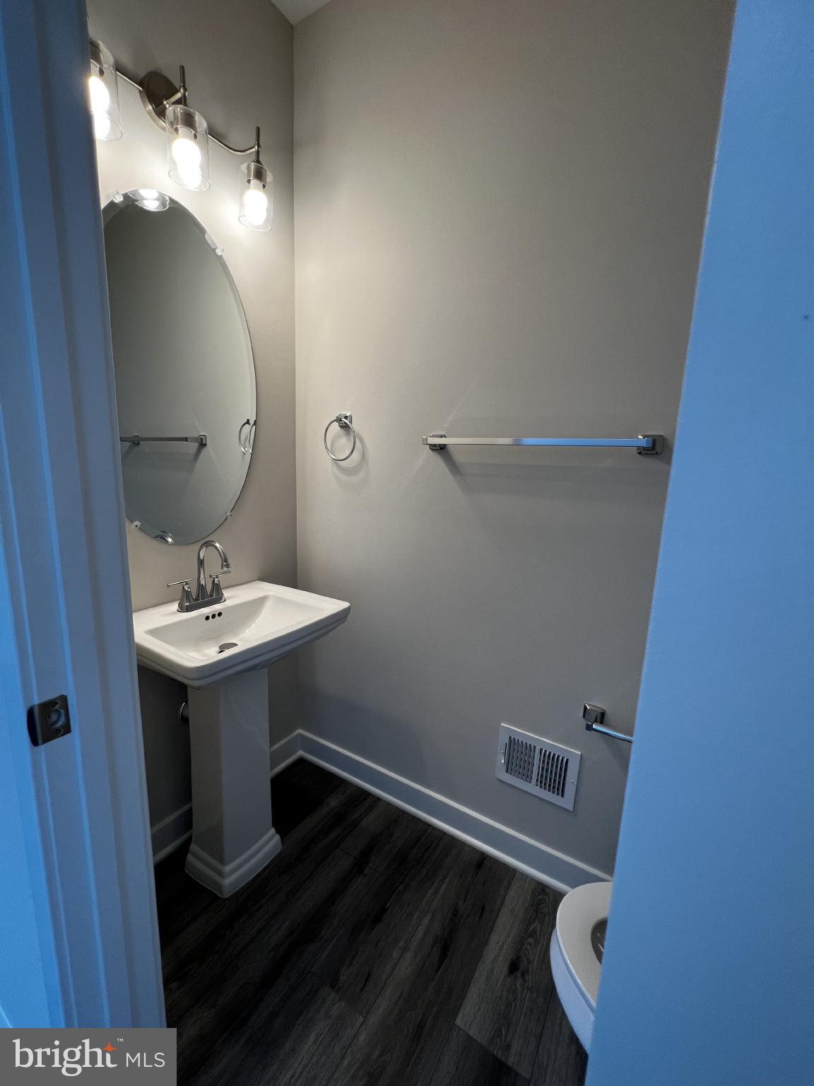 38 Meadow View Lane Colonial Beach, VA 22443 - Photo 21 of 44 Modern half-bath with sleek finishes.