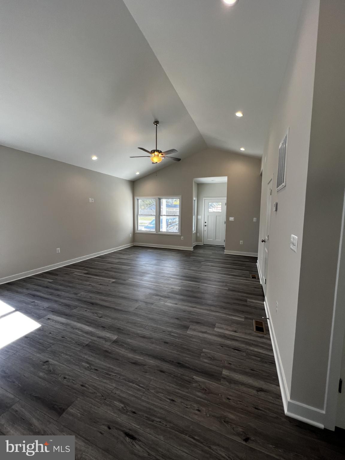 38 Meadow View Lane Colonial Beach, VA 22443 - Photo 22 of 44 Spacious, sunlit living area with high ceilings.