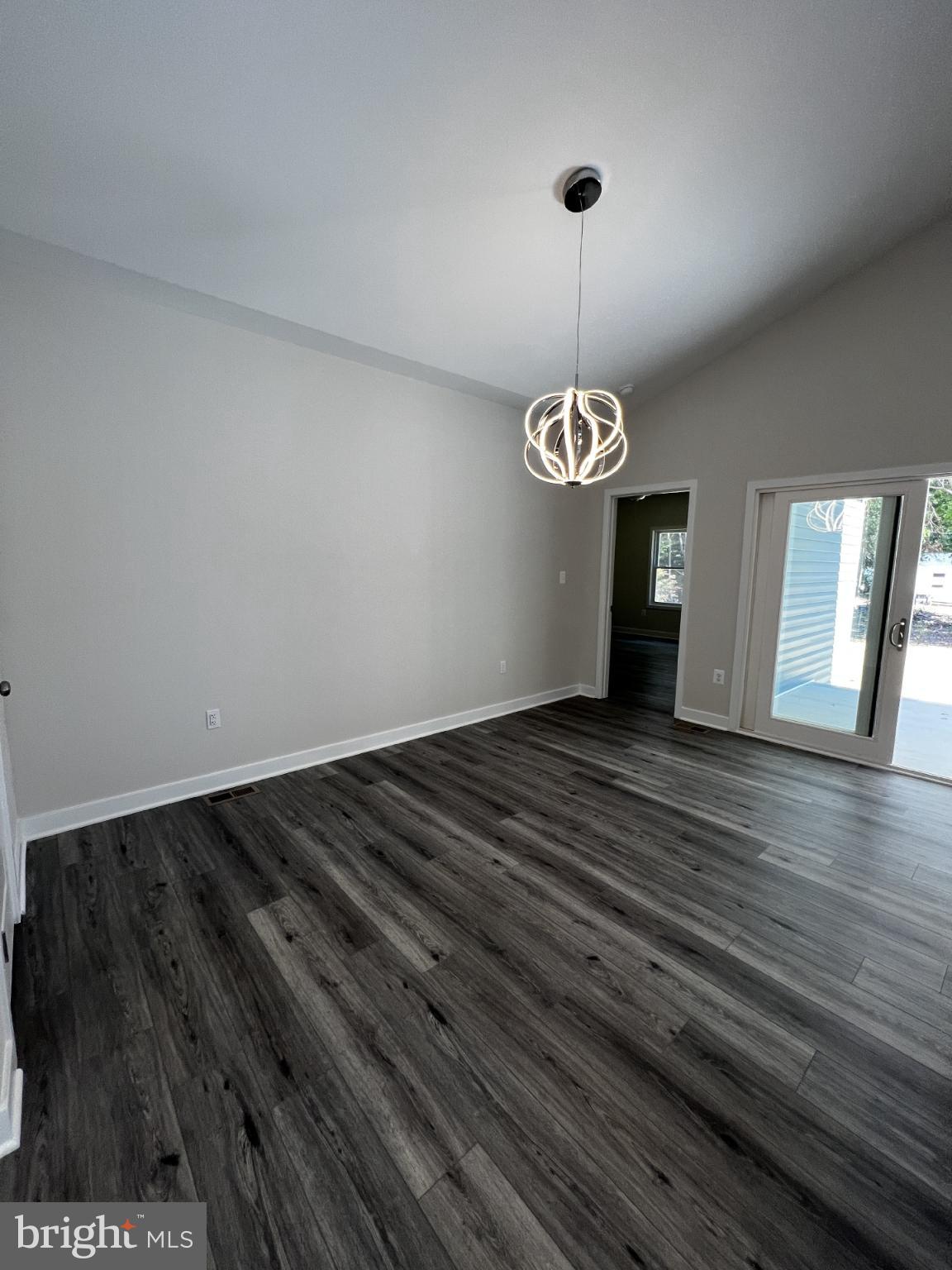38 Meadow View Lane Colonial Beach, VA 22443 - Photo 25 of 44 Spacious room with modern lighting design.