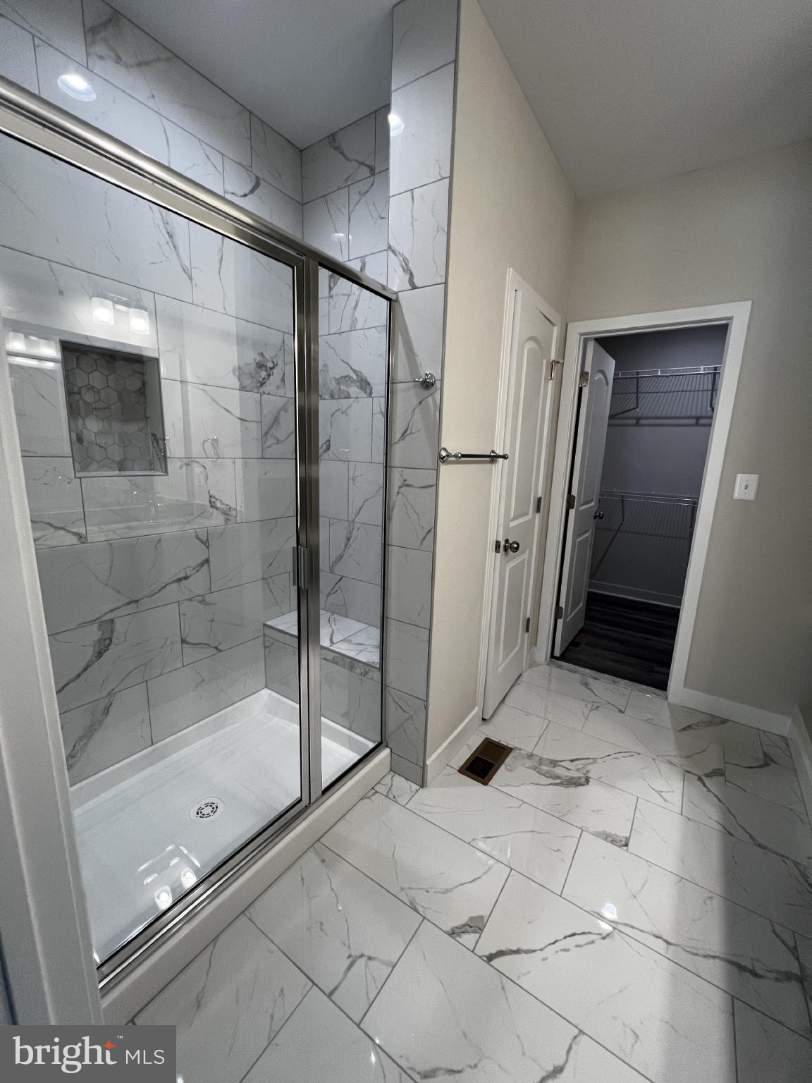38 Meadow View Lane Colonial Beach, VA 22443 - Photo 30 of 44 Sleek modern bathroom with elegant tiles.