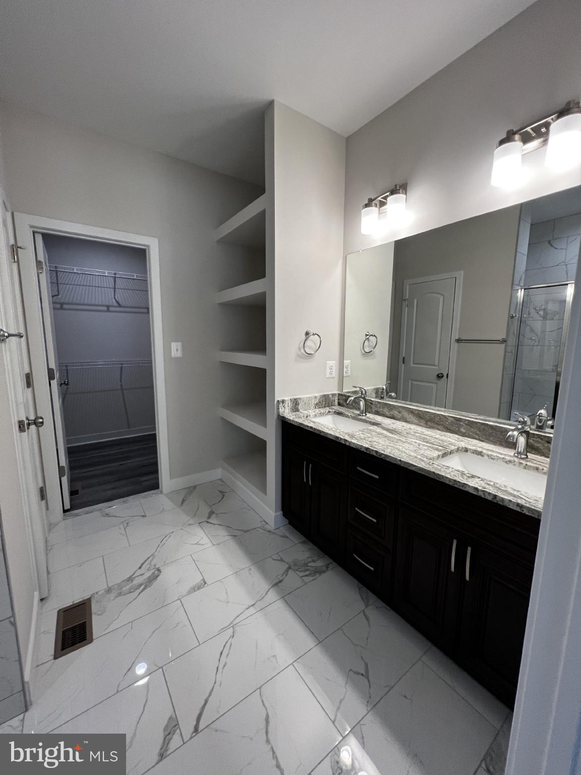 38 Meadow View Lane Colonial Beach, VA 22443 - Photo 31 of 44 Sleek modern bathroom with elegant finishes.