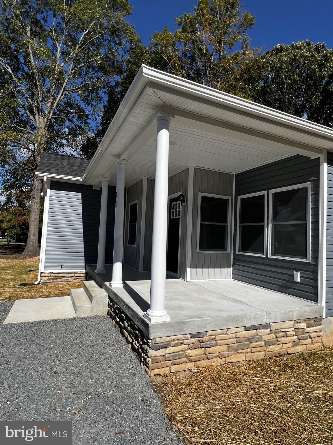 38 Meadow View Lane Colonial Beach, VA 22443 - Photo 5 of 44 Charming porch with stone accents awaits you.