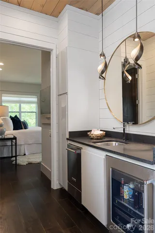 a kitchen with a sink and a stove