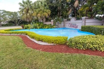 a view of a yard with swimming pool