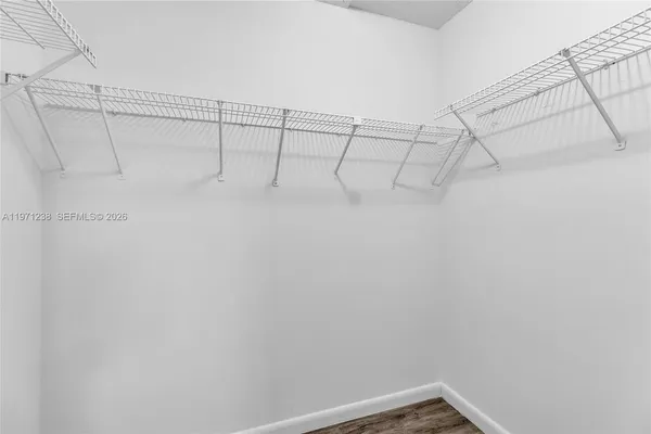 a view of a room with racks on the wall