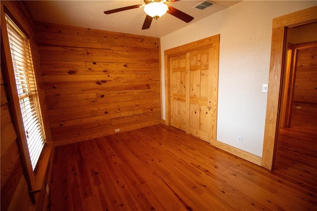 11701 Highway 359 Mathis, TX 78368 - Photo 9 of 35 wooden floor in an empty room