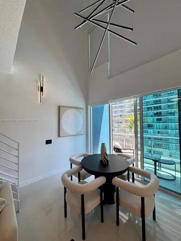 a workspace with furniture and a window