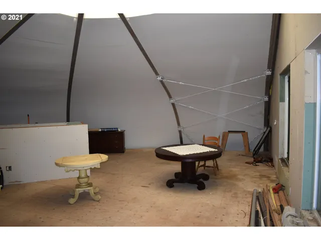 a bathroom with a toilet a sink and a mirror