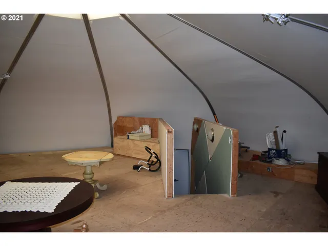 a view of a living room and bathroom