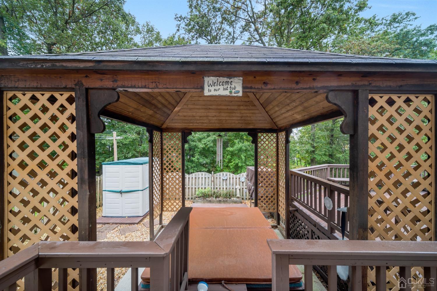 13 Churchill Road Edison, NJ 08820 - Photo 5 of 28 a view of a wooden chairs and table in the balcony