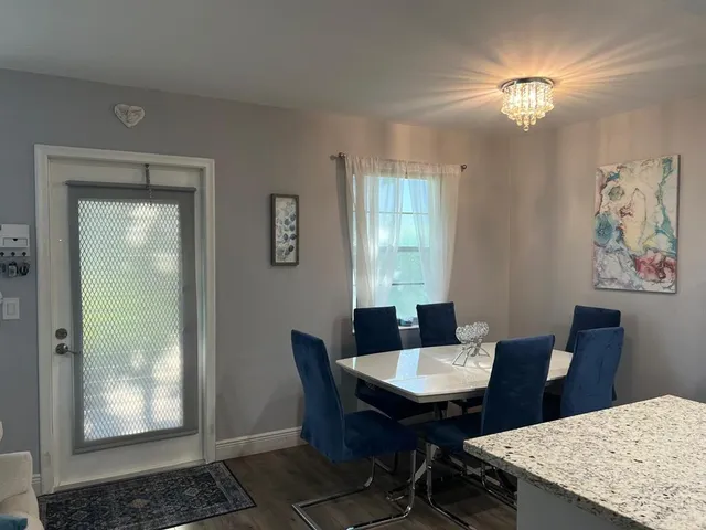 a view of a dining room with furniture