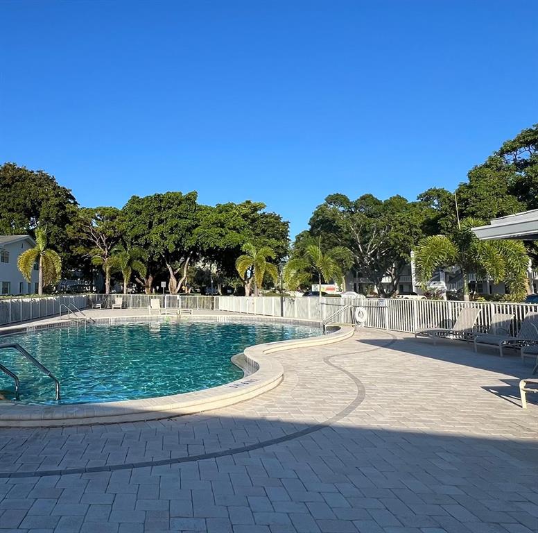 418 Durham, Unit 418 Deerfield Beach, FL 33442 - Photo 33 of 47 a view of a yard and basketball court