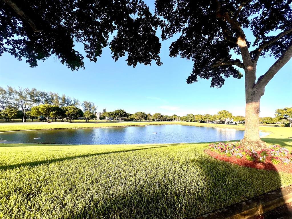 418 Durham, Unit 418 Deerfield Beach, FL 33442 - Photo 37 of 47 a view of lake with green space