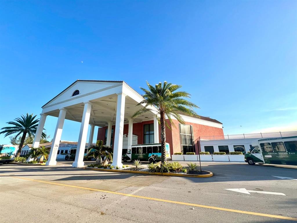 418 Durham, Unit 418 Deerfield Beach, FL 33442 - Photo 38 of 47 front view of a building with a street