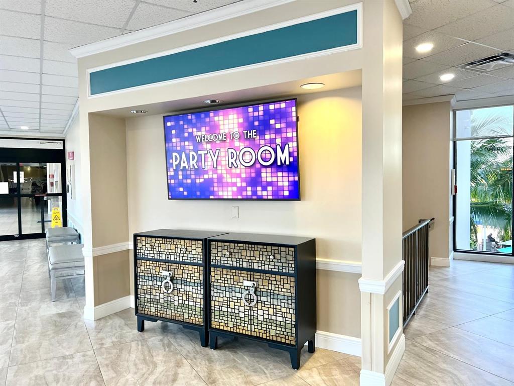 418 Durham, Unit 418 Deerfield Beach, FL 33442 - Photo 46 of 47 a view of a furniture and an entryway