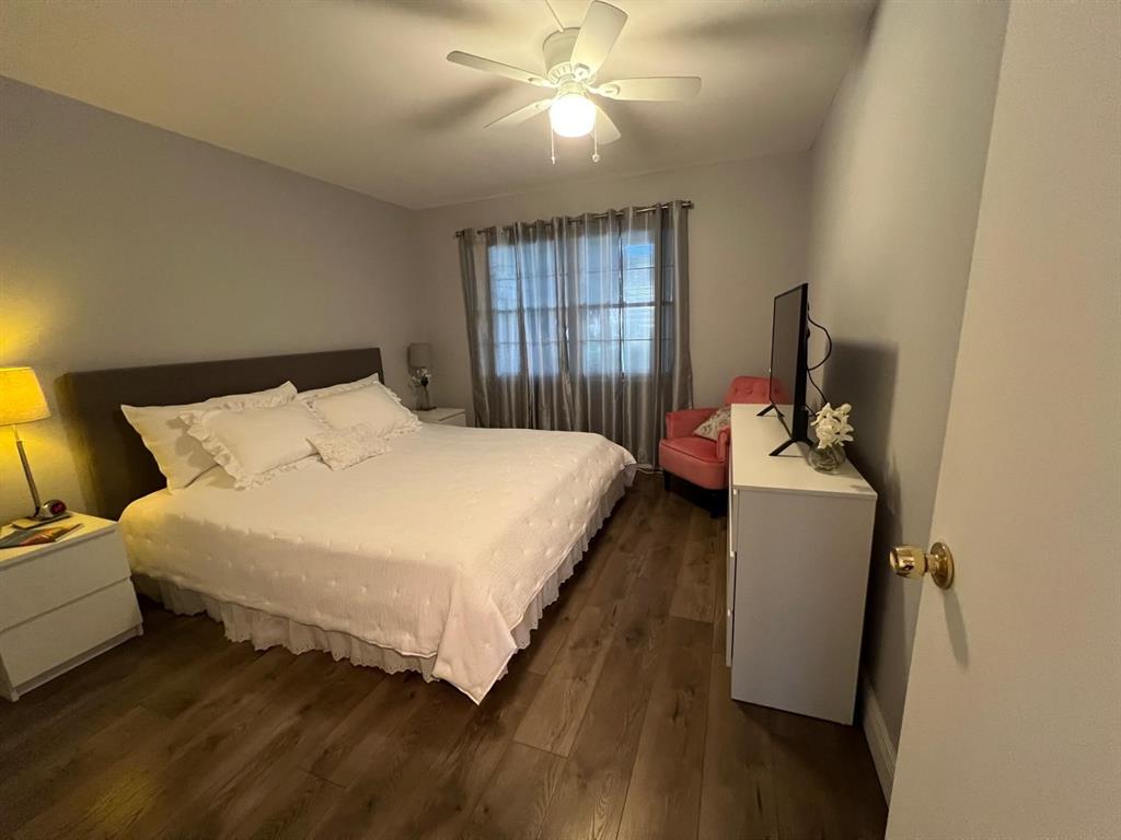 418 Durham, Unit 418 Deerfield Beach, FL 33442 - Photo 10 of 47 a bedroom with bed and window