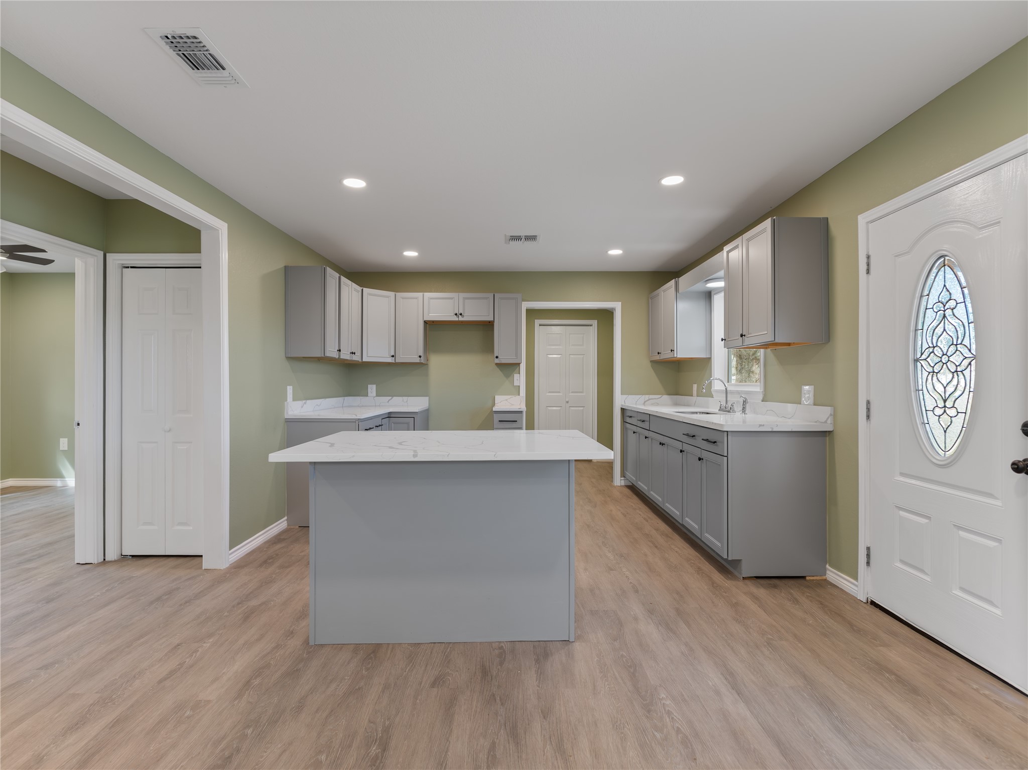 2110 Horn Road Bay City, TX 77414 - Photo 3 of 11 a large kitchen with a center island stainless steel appliances and cabinets