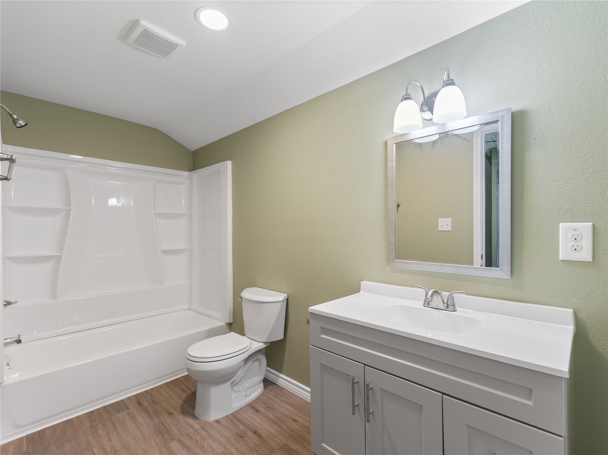 2110 Horn Road Bay City, TX 77414 - Photo 5 of 11 a bathroom with a toilet sink and a mirror