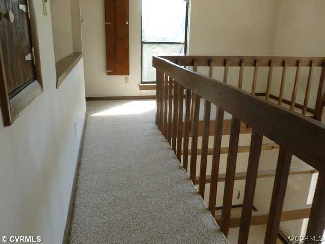 15916 Tri Gate Road Chester, VA 23831 - Photo 6 of 7 a view of a balcony