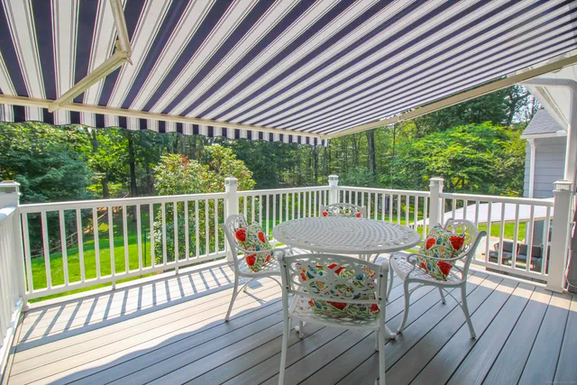 a view of a chairs on the roof deck