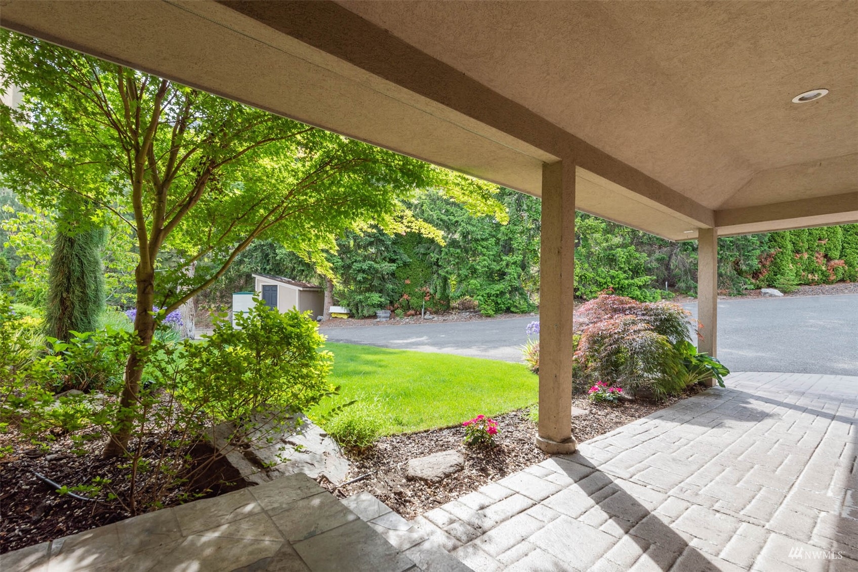 13699 Whitebird Place Orondo, WA 98843 - Photo 10 of 36 a view of a garden with a patio