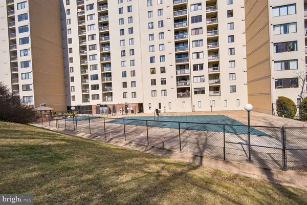 a view of a swimming pool with a backyard