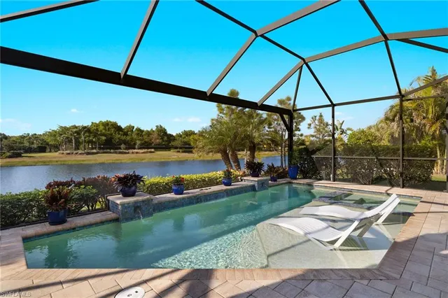 a living room with furniture and a yard