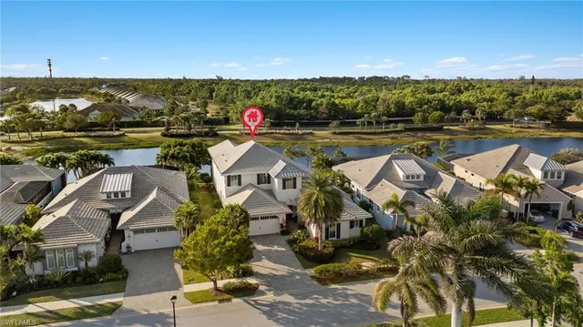 a view of a town with mountains in the background