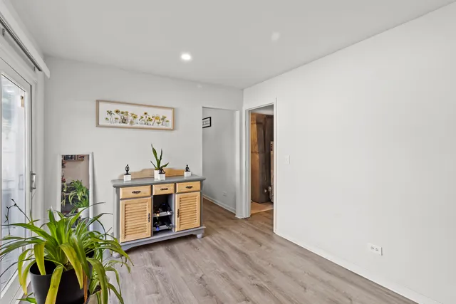 a view of kitchen with stainless steel appliances a stove and a refrigerator