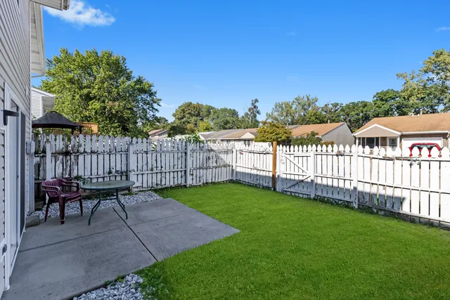 a view of a deck with a yard
