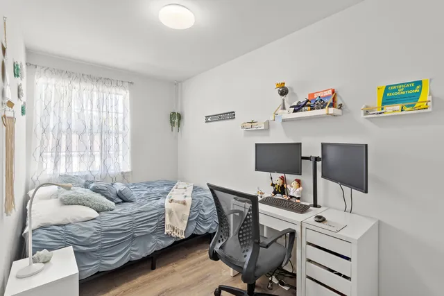 a workspace with furniture and a window