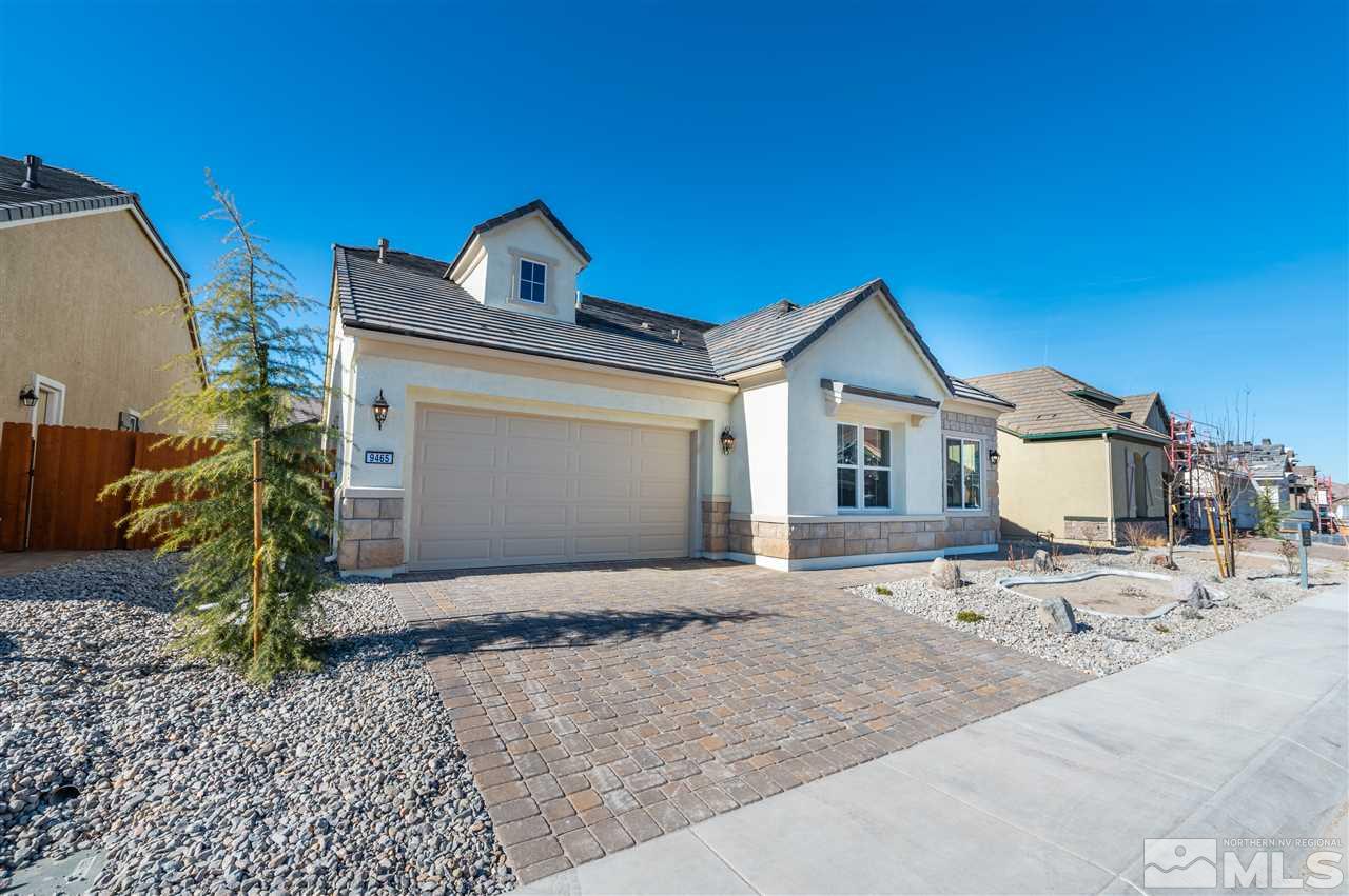9465 Flying Horse Road, Unit HOMESITE 117 Reno, NV 89521 - Photo 1 of 23 a front view of a house with a yard and garage