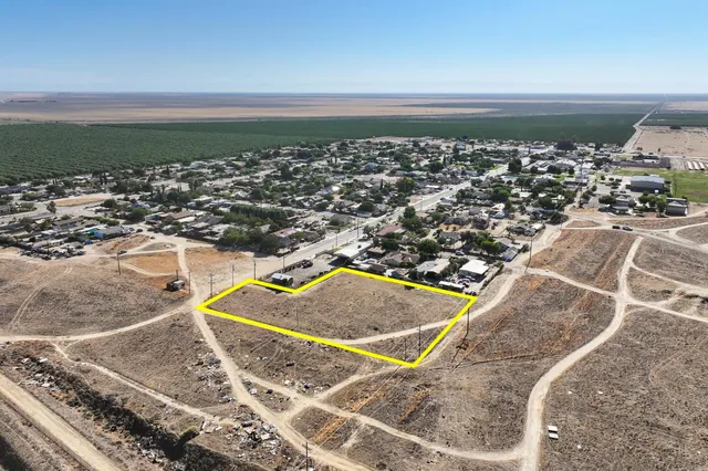 an aerial view of beach and ocean