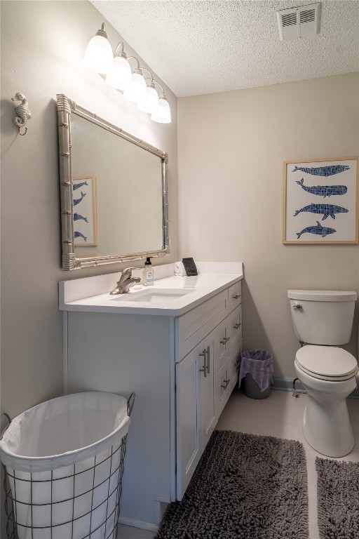 2582 Forest Ridge Drive, Unit N2 Fernandina Beach, FL 32034 - Photo 14 of 30 a bathroom with a double vanity sink mirror and toilet