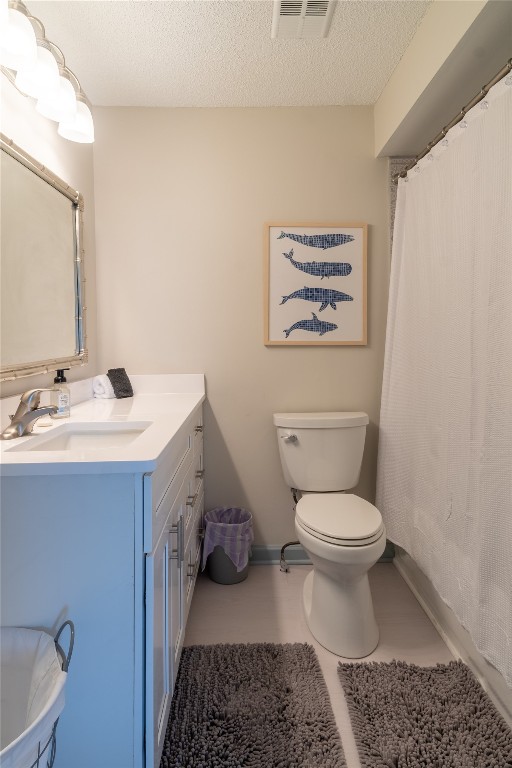 2582 Forest Ridge Drive, Unit N2 Fernandina Beach, FL 32034 - Photo 19 of 30 a bathroom with a sink a toilet and a mirror