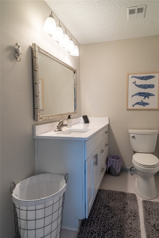 2582 Forest Ridge Drive, Unit N2 Fernandina Beach, FL 32034 - Photo 29 of 30 a bathroom with a double vanity sink mirror and toilet