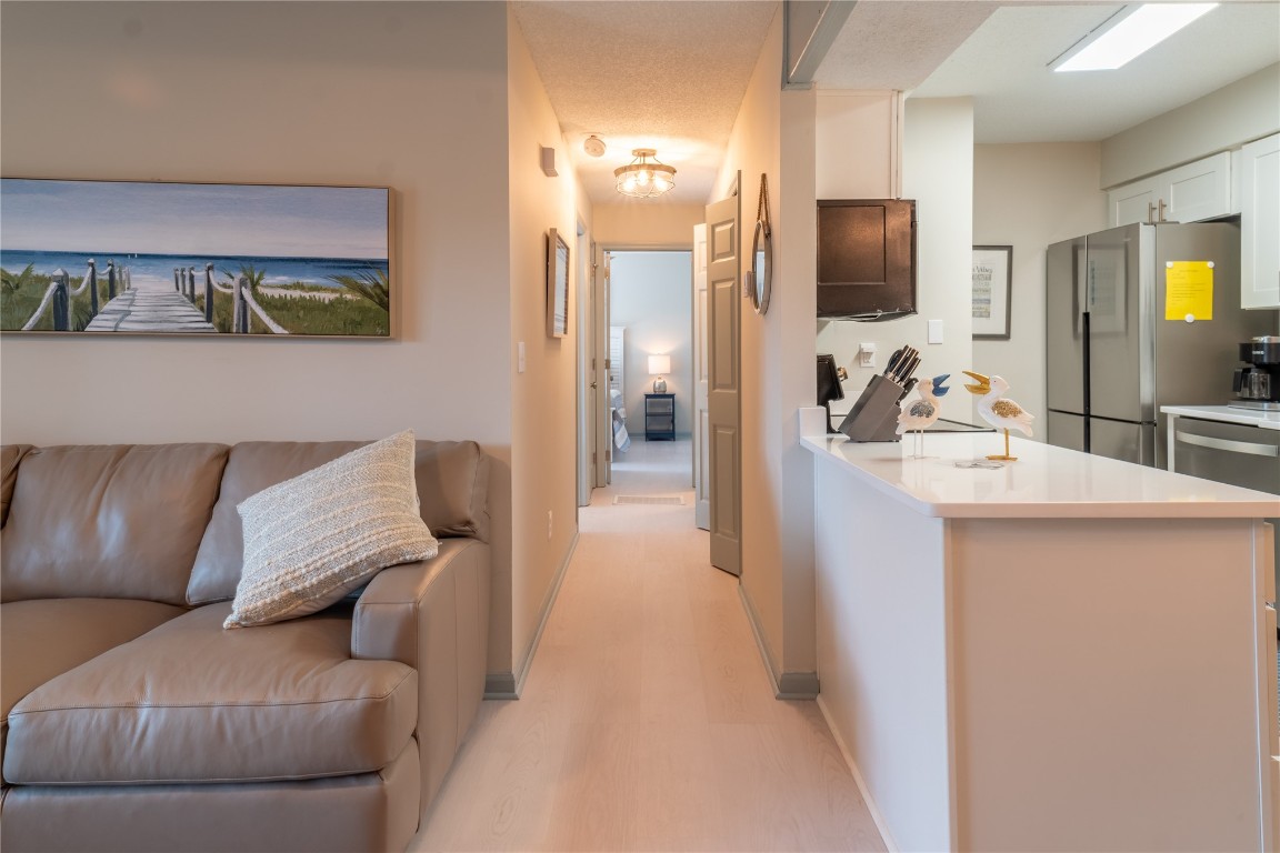 2582 Forest Ridge Drive, Unit N2 Fernandina Beach, FL 32034 - Photo 5 of 30 a living room with furniture and a flat screen tv
