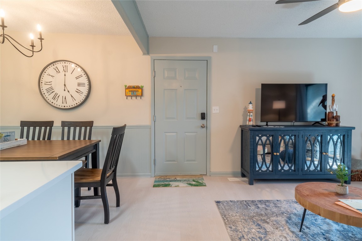 2582 Forest Ridge Drive, Unit N2 Fernandina Beach, FL 32034 - Photo 9 of 30 a view of a room that has a table and a chair in it