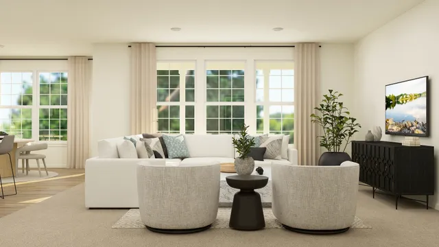 a living room with furniture and large windows