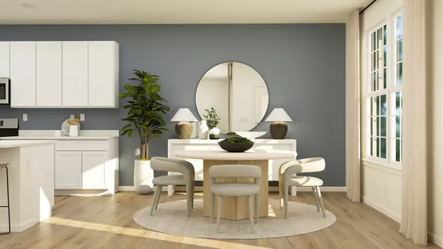 a dining room with a table and chairs